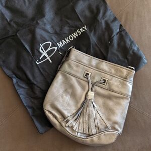 B. Makowsky Silver Shoulder Bag with Tassel Detail